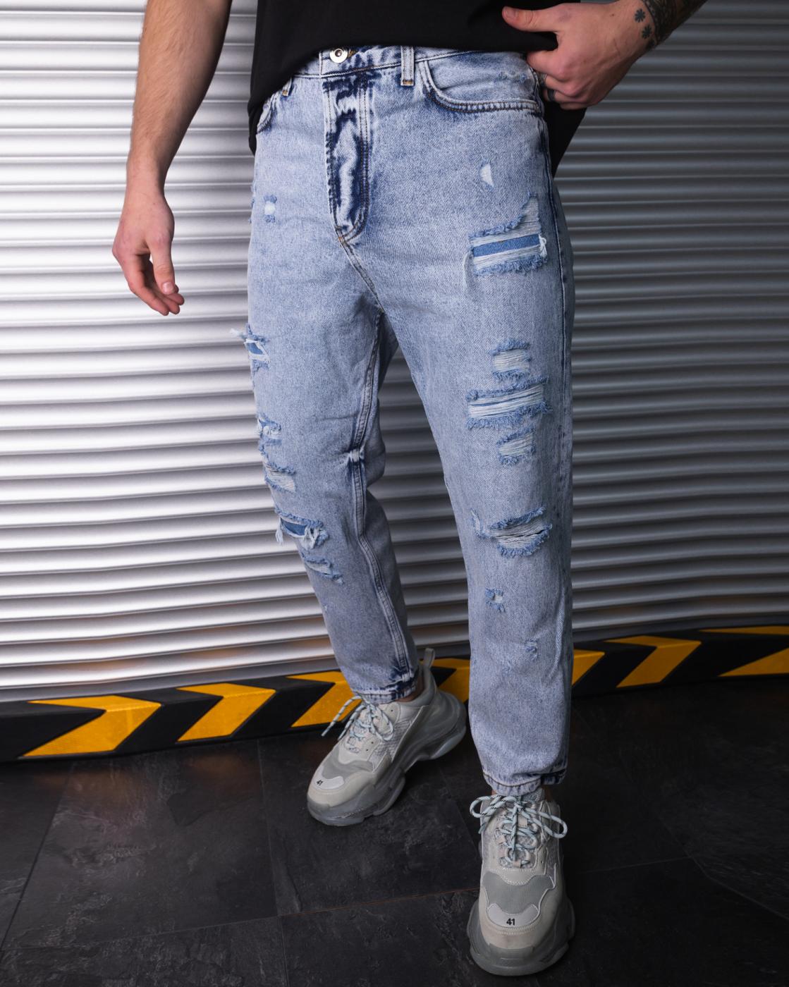 Дизайнерські завужені джинси з перфорацією BEZET