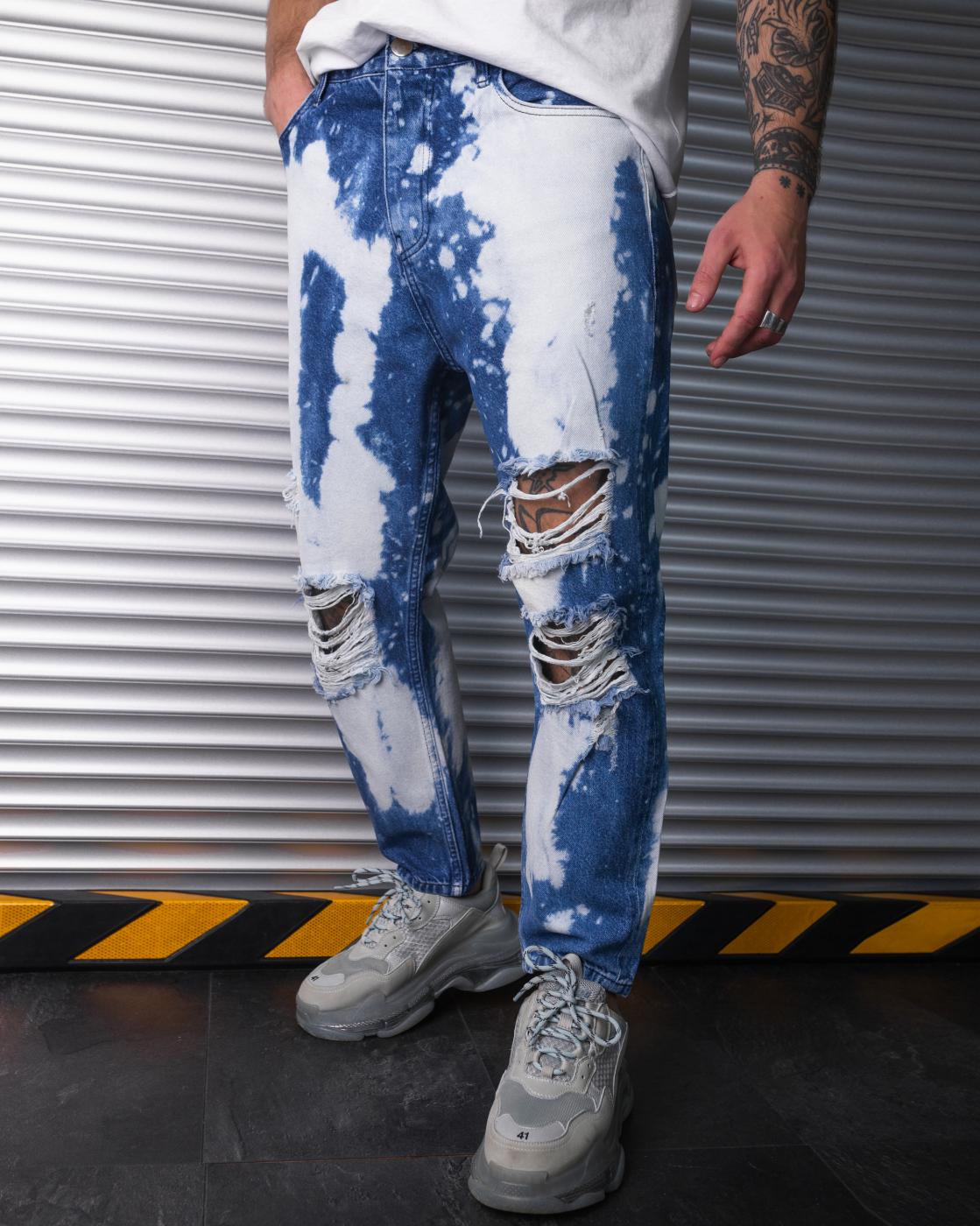 Дизайнерские зауженные джинсы с перфорацией BEZET
